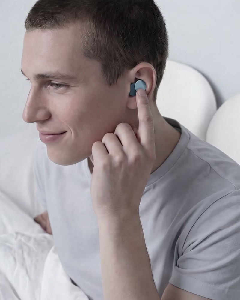 Person sleeping with Orbit Earplugs