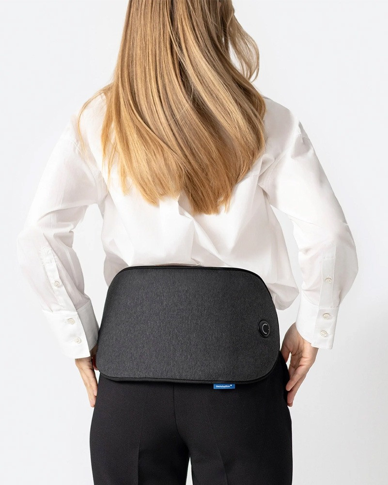 Woman wearing Embrace Heating Pad