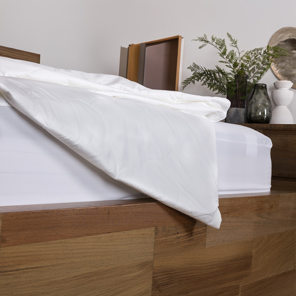 Bambi Advansa Suprelle Blue Quilt on a bed