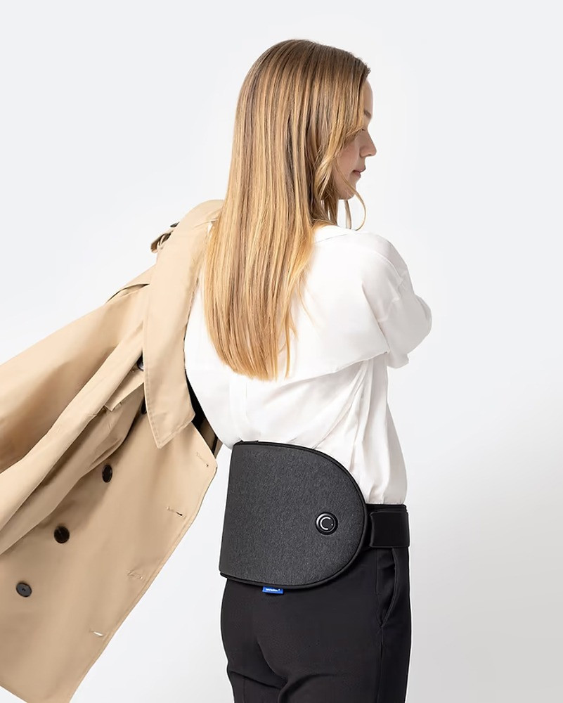 Woman wearing Embrace Heating Pad