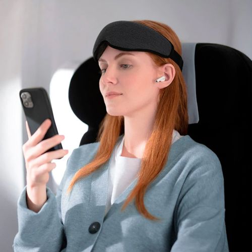 Man with the neck wrap using an ipad